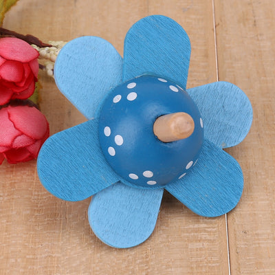 Toupie en bois fleur bleue - les jeux en bois